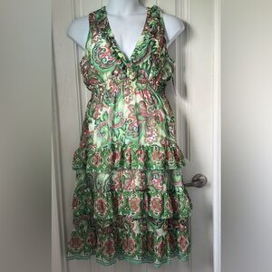 Festive pink and green dress, embellished with sequins